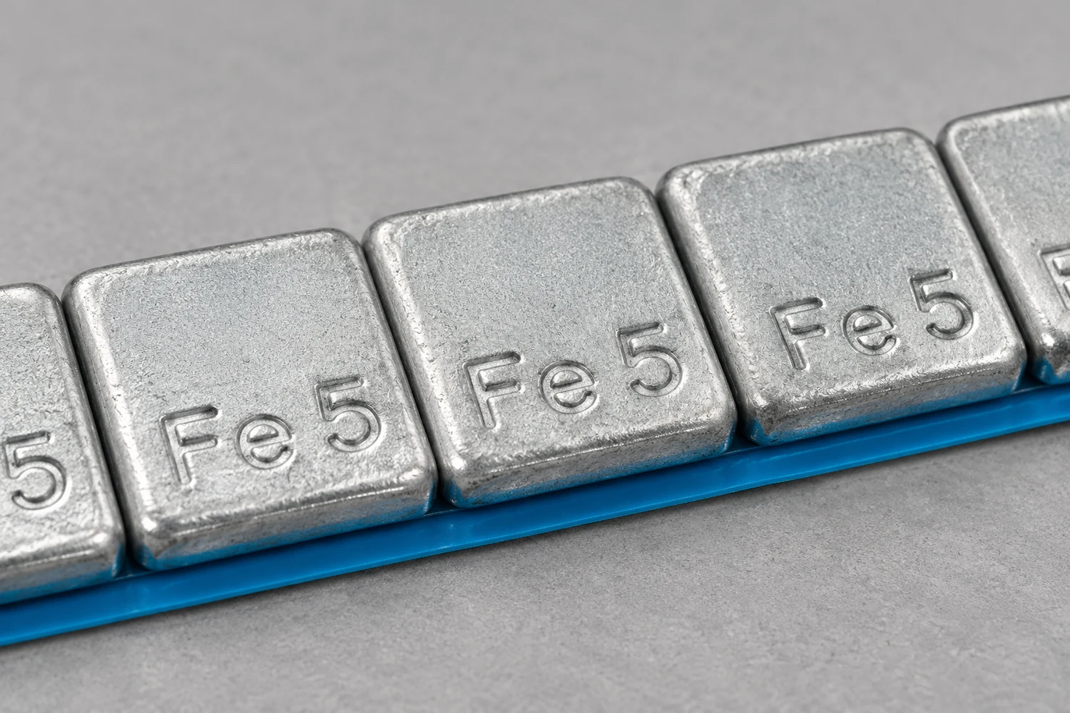 How should buyers select steel adhesive wheel weights?