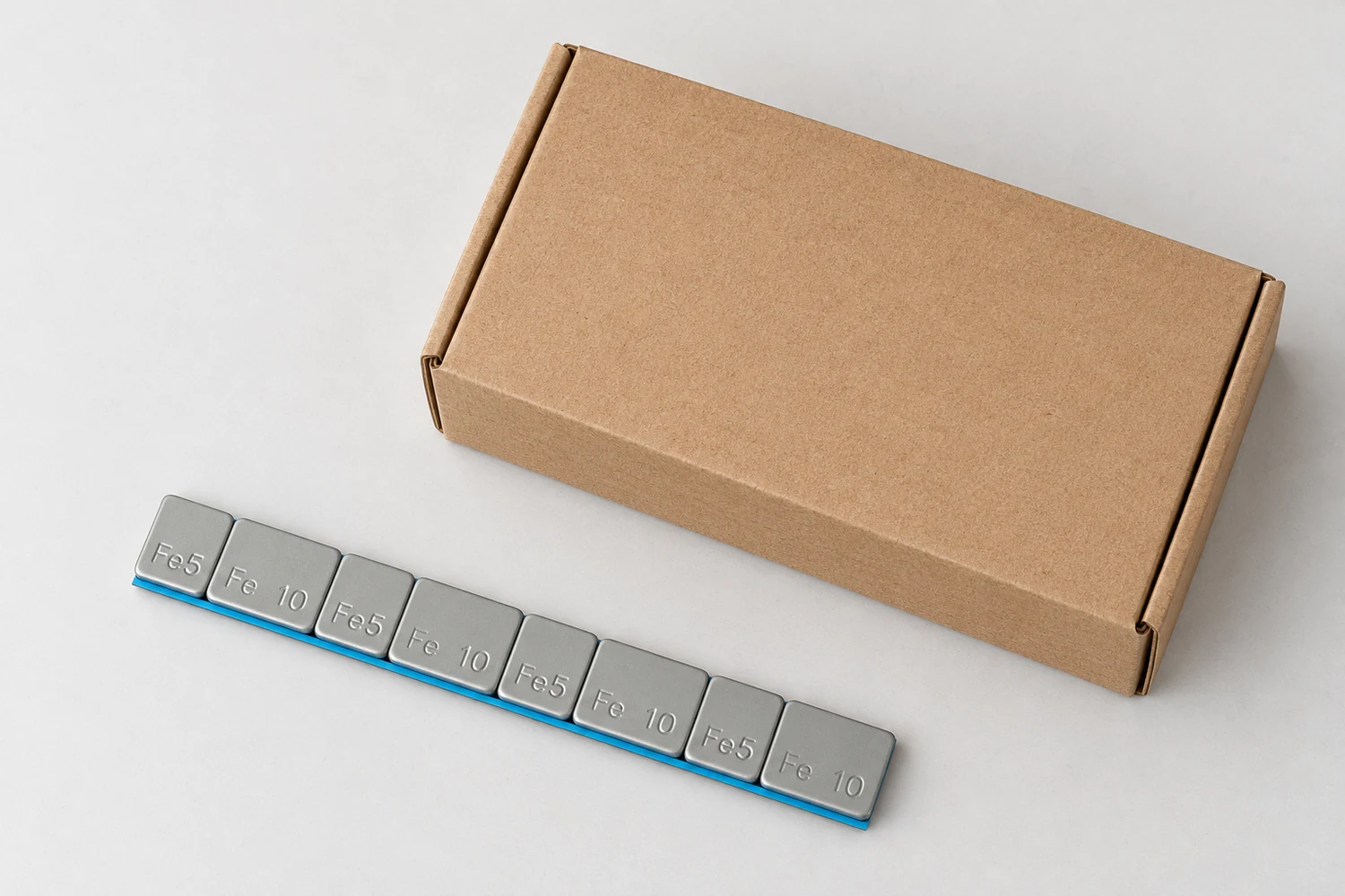 What defines a grey coated steel adhesive wheel weight sample?