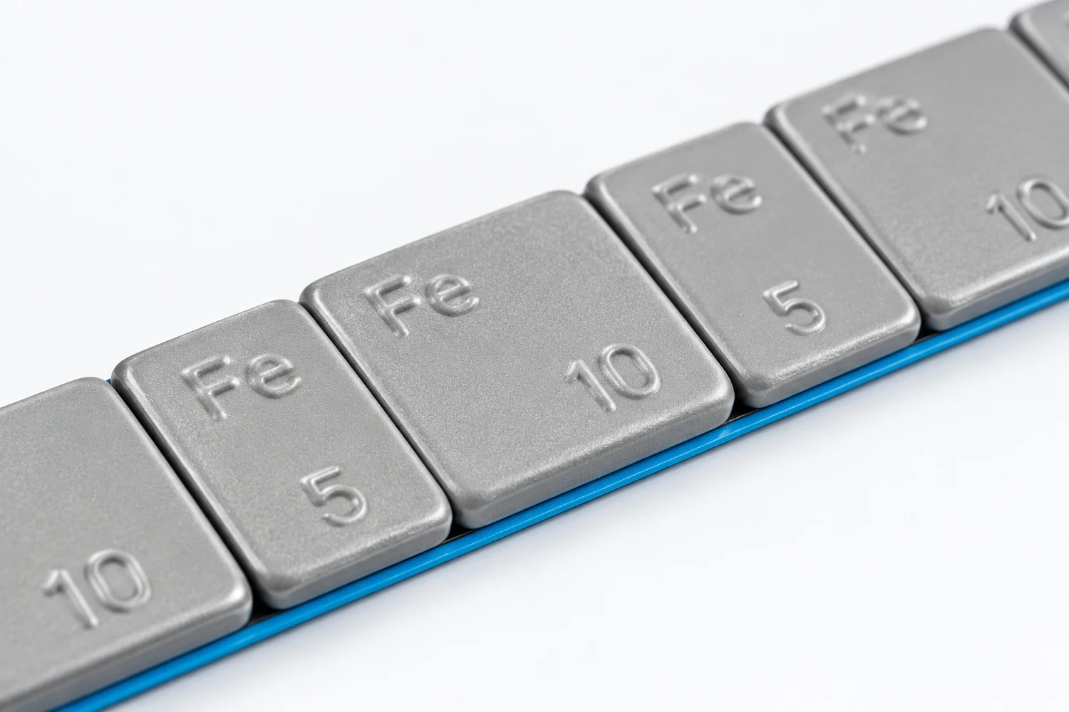 What defines a grey coated steel adhesive wheel weight sample?